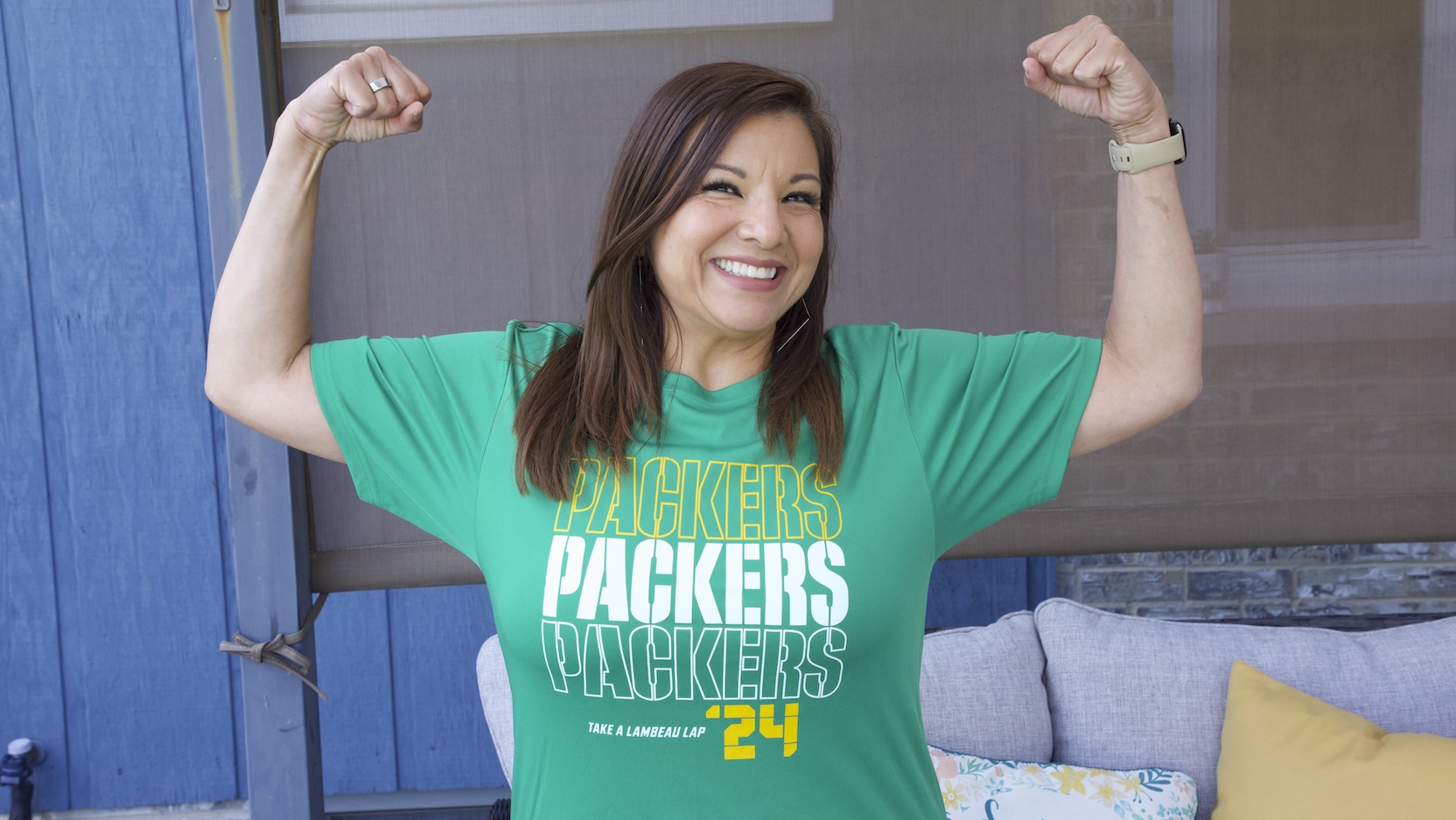 Angelica Guisinger with green Packers shirt