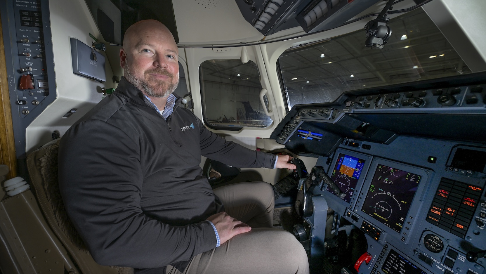 Chris Guare in plane cockpit.