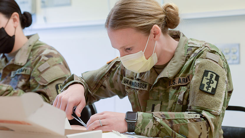 Army Lt. Sarah Van Wingerden practices trauma technique in the UChicago Medicine Simulation Center