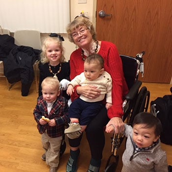 Diane with her grandkids in the CCD on Christmas eve