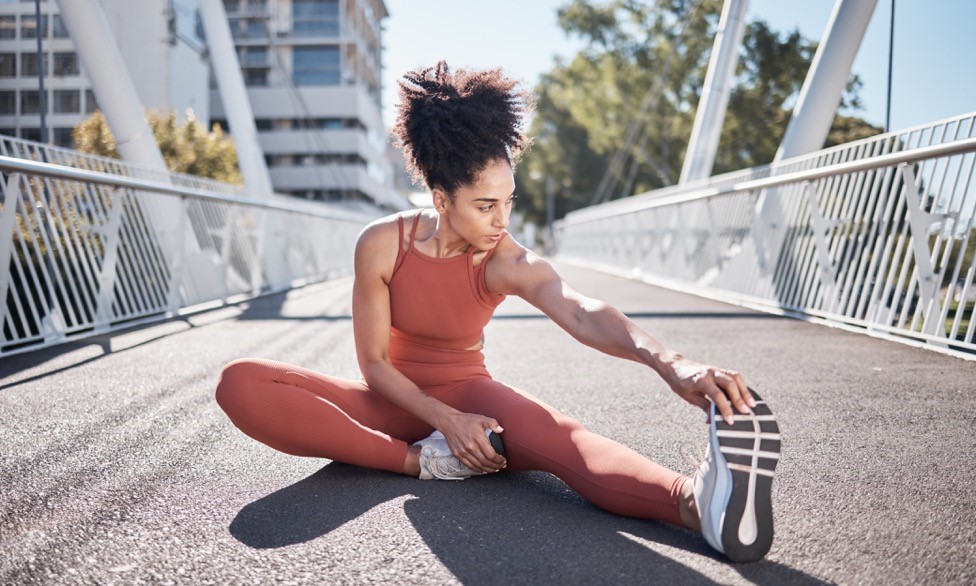 A woman stretches before a checkup. 