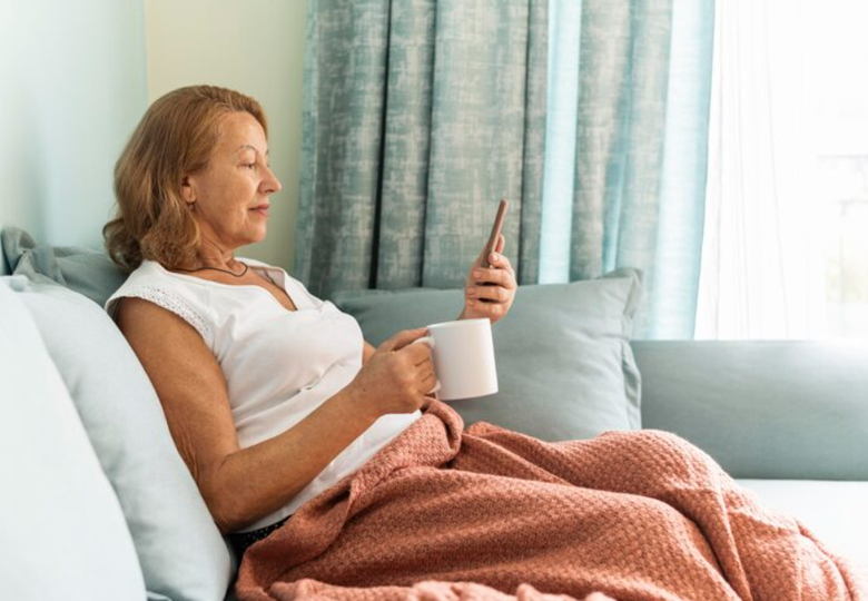 An adult patient recovering comfortably at home after an outpatient surgical procedure.