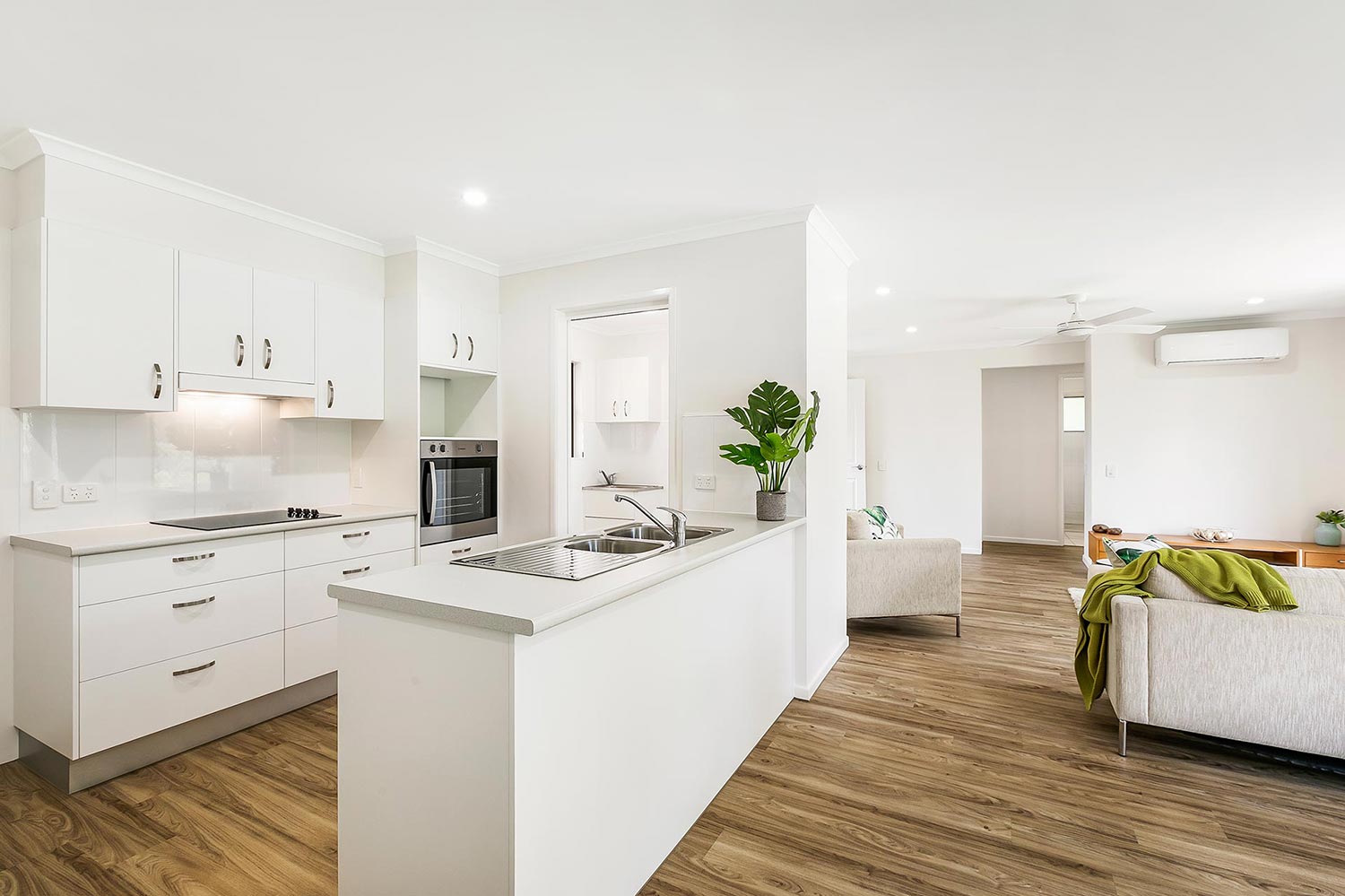 Internal photo of Blue Care Nandeebie retirement village kitchen and living area, with modern fixtures and open plan design