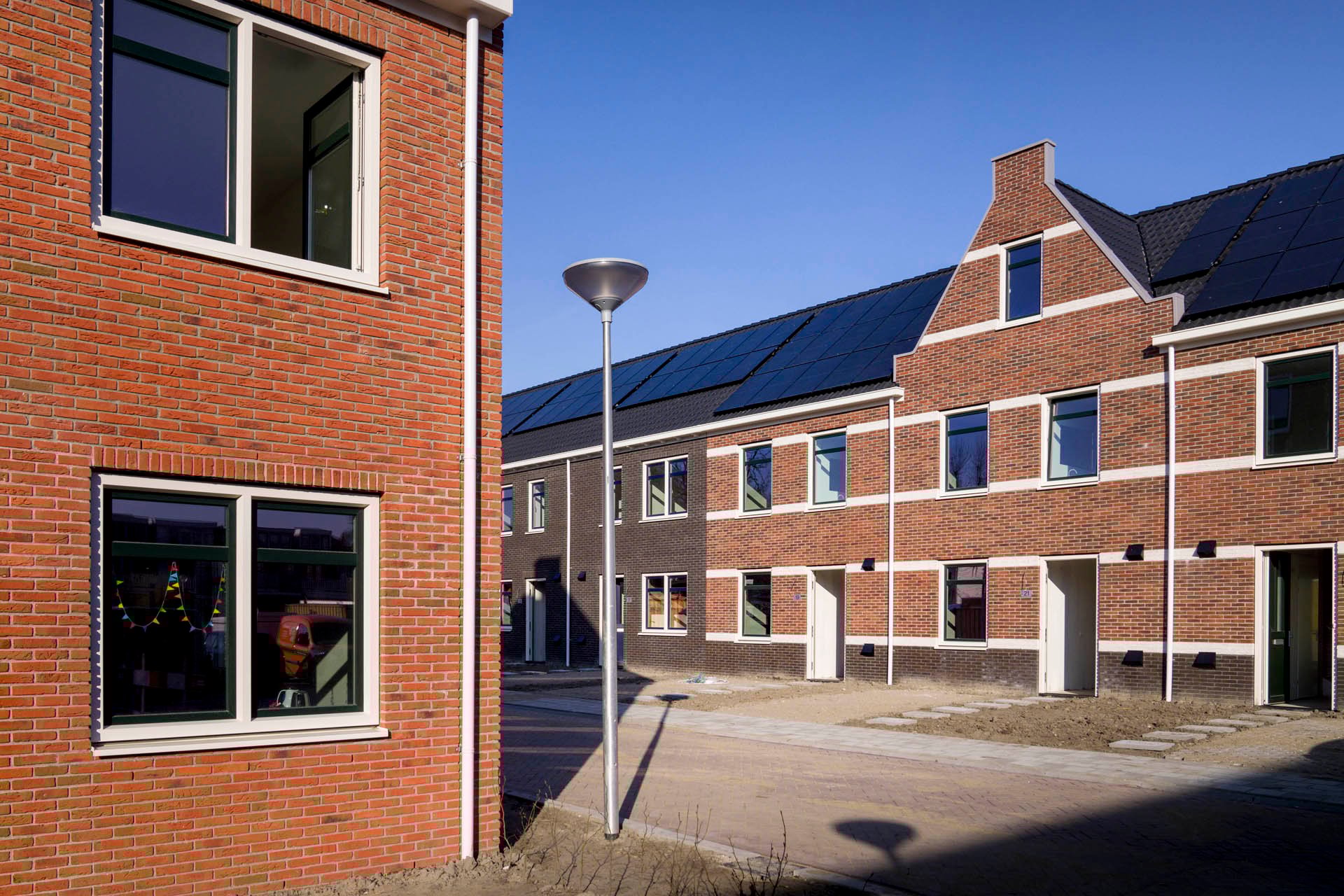 Gevels van de woningen in woonwijk Fluwelenhof in Gouda