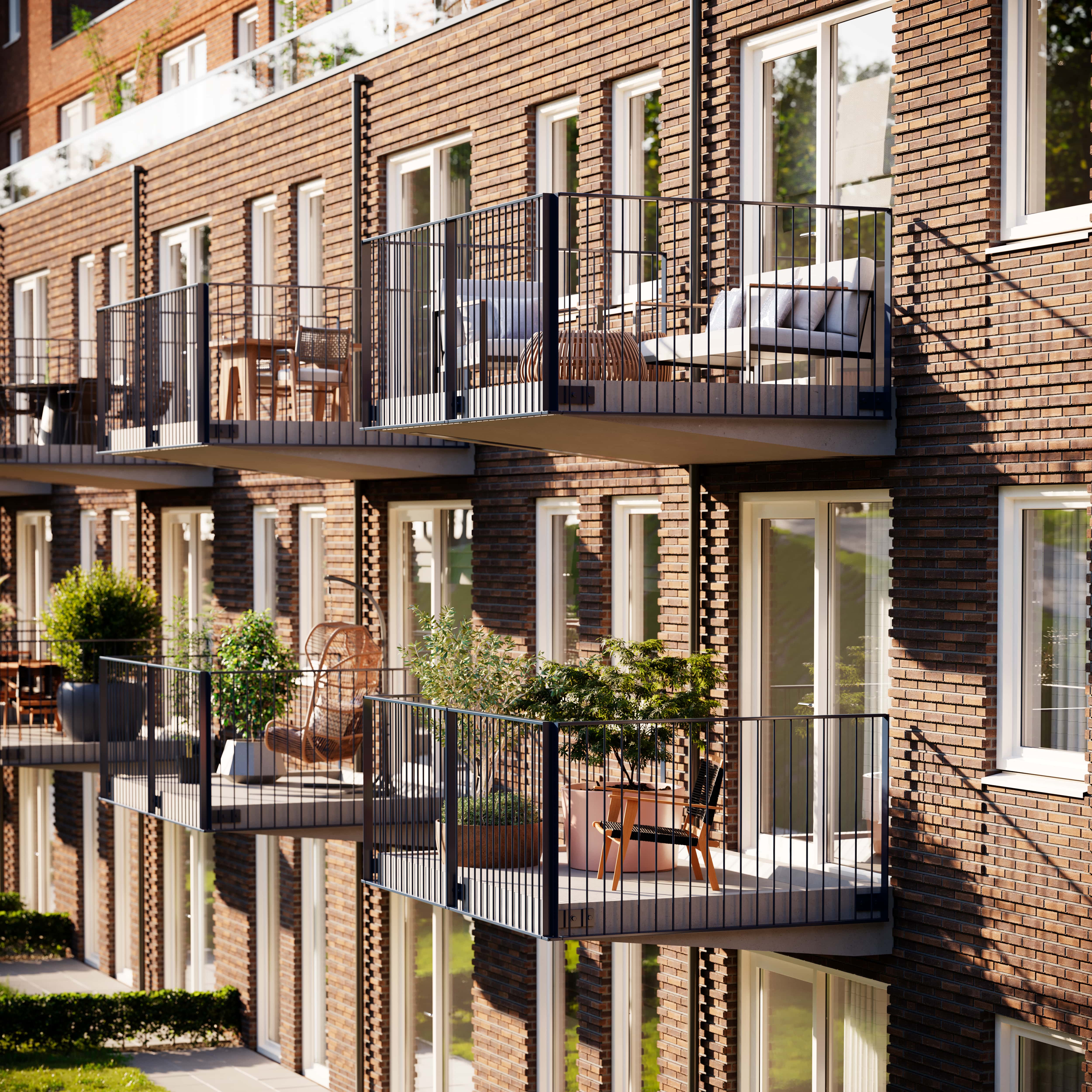 Impressie van een galerij gebouw met uitpandige balkons