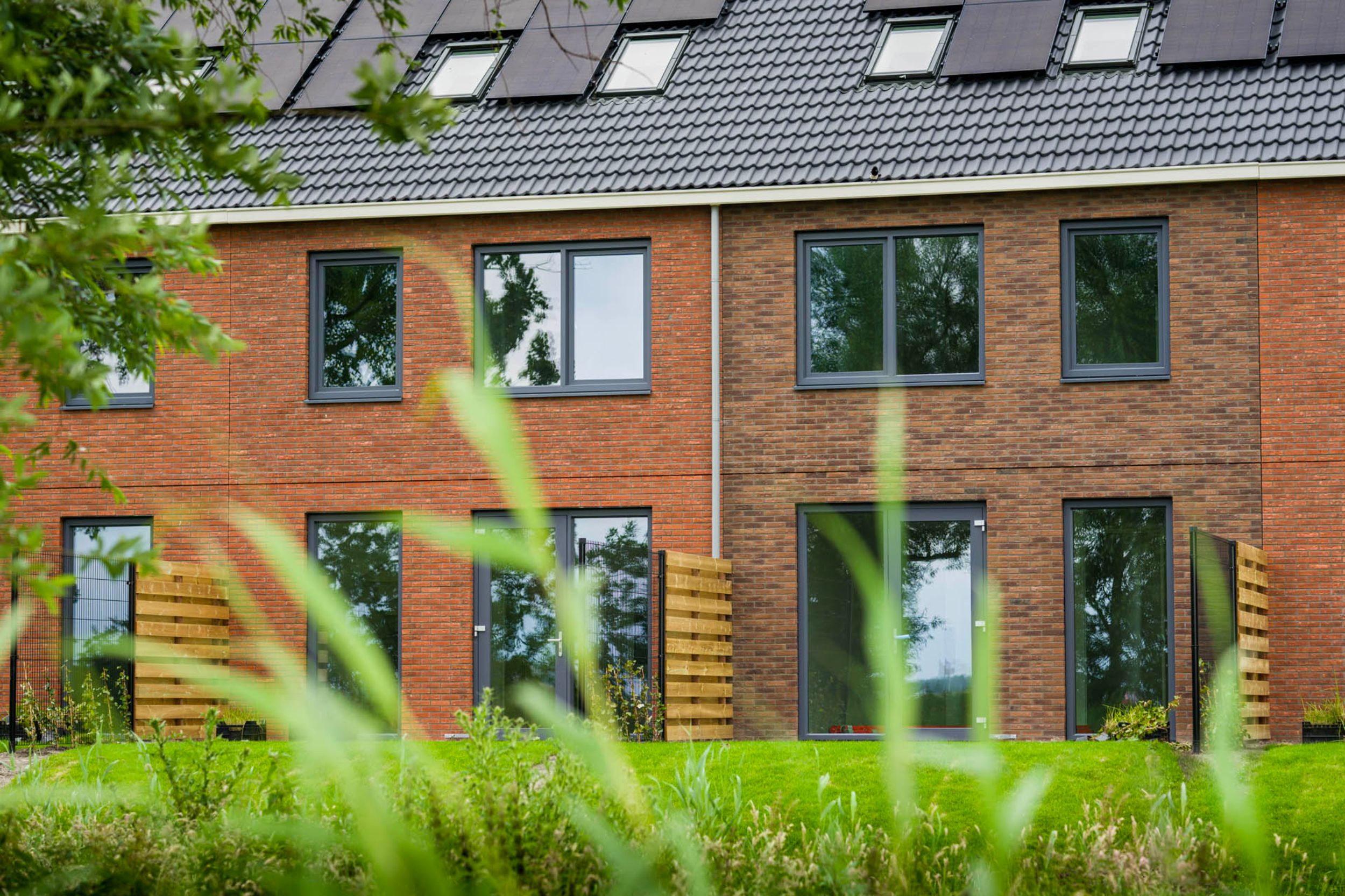 Achtertuin woningen Edam - De Botter