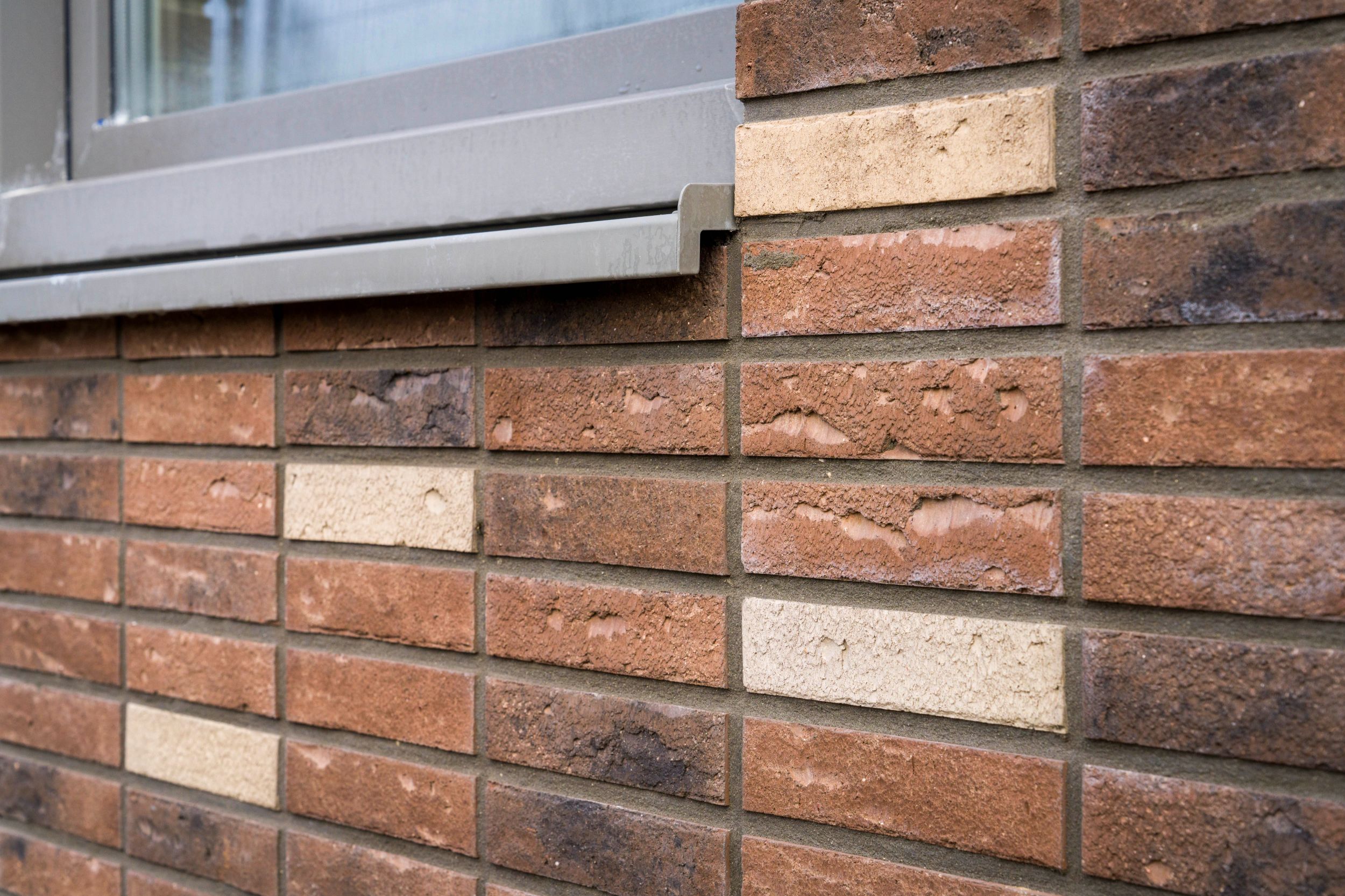 Zwolle - De Tippe - Detailfoto - Diverse kleuren gevelstenen