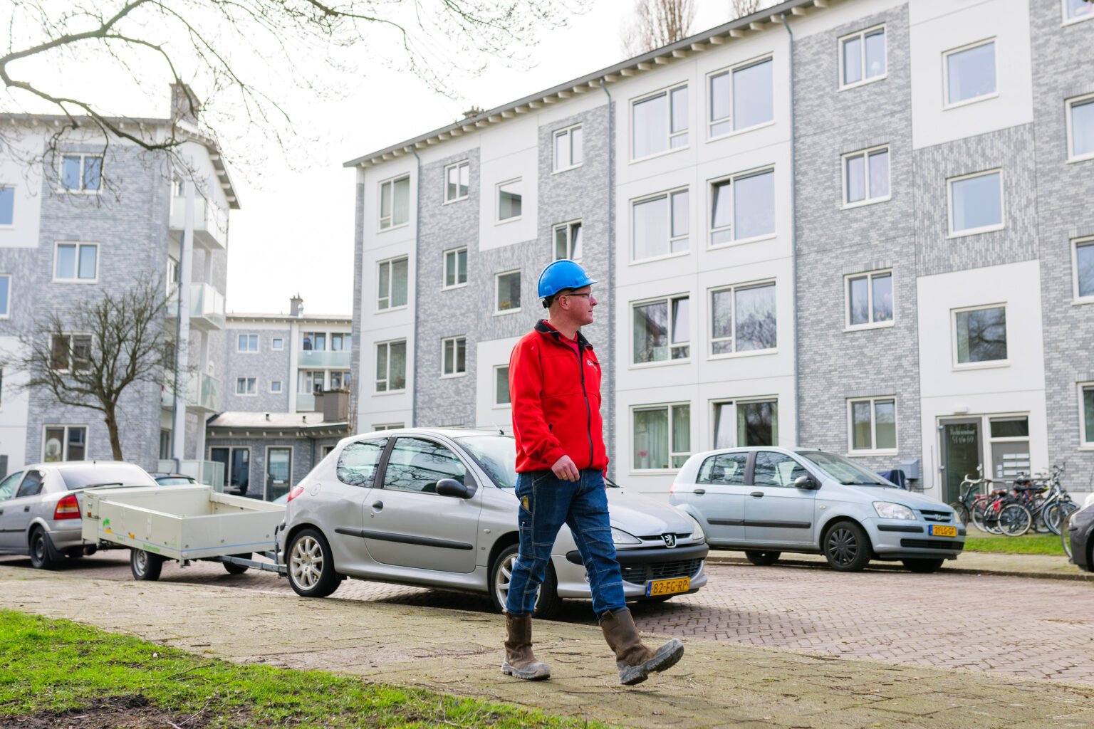 Werknemer voor woningen met nieuwe gevel