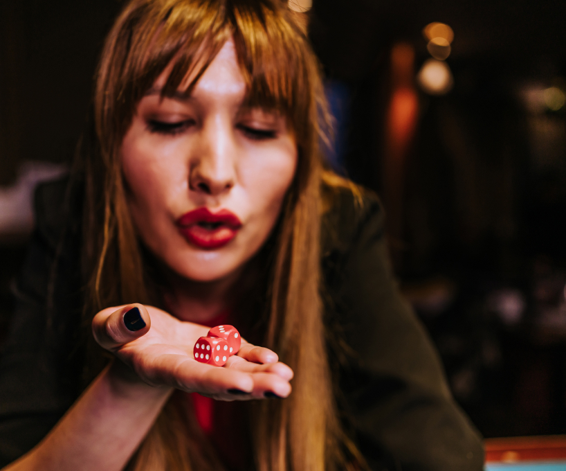 Woman holding lucky dice 