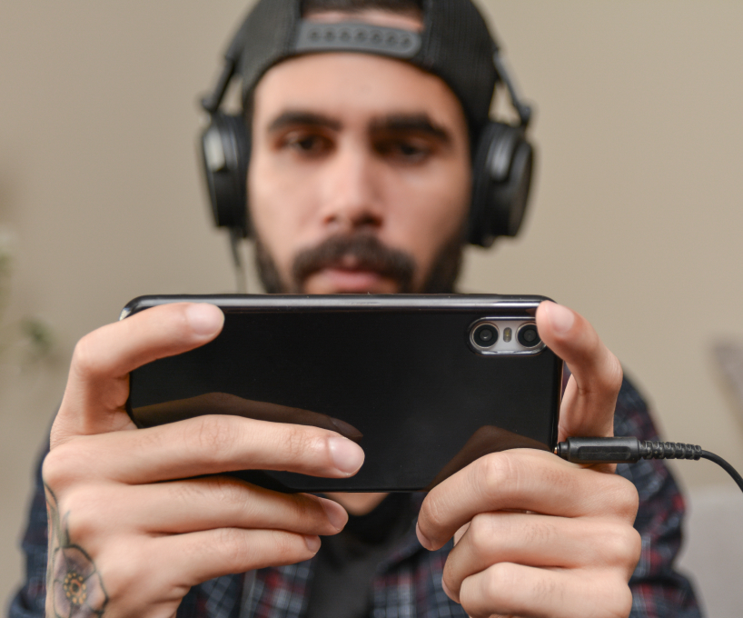 Man playing game on phone