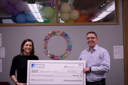 Energy Harbor presenting check to Footprints Center for Autism