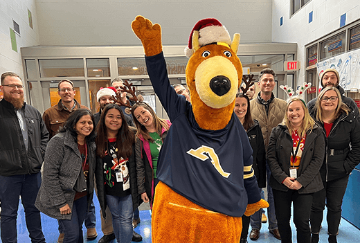 Group of Energy Harbor representatives and The University of Akron Mascot Zippy 