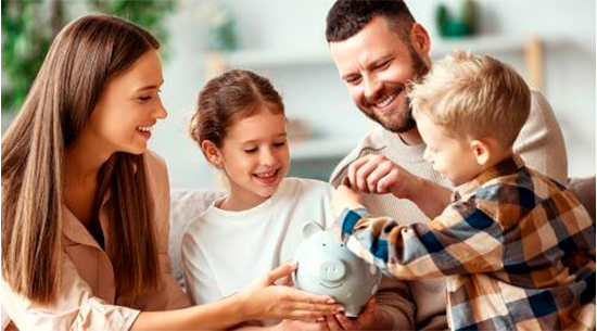 Family adding change to piggy bank together