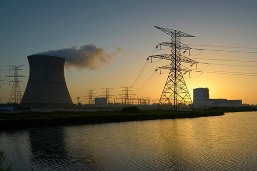 Energy Harbor’s Davis-Besse nuclear power plant, sunset silhouette