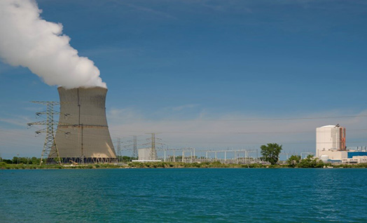 Energy Harbor’s Davis-Besse nuclear power plant, cooling tower across the water