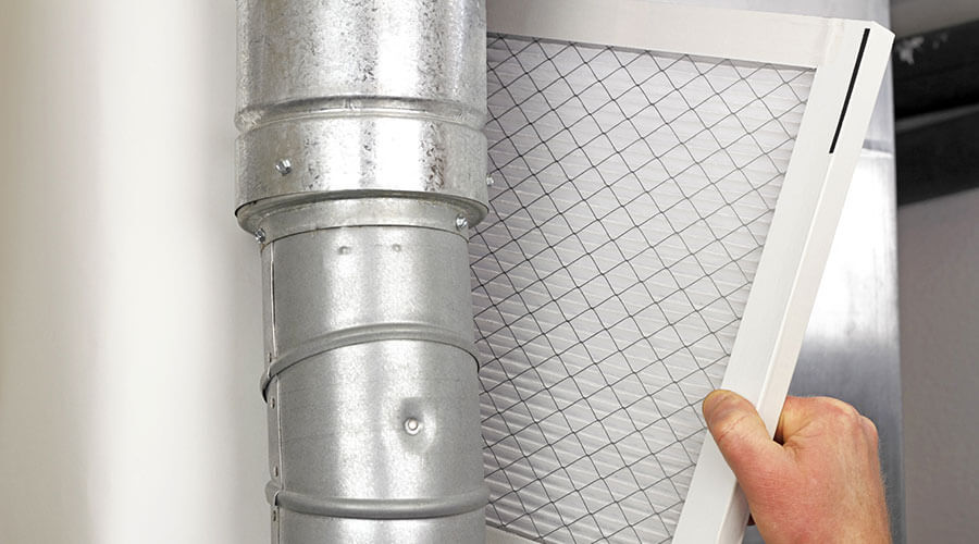 Changing air filters in a heating and cooling system