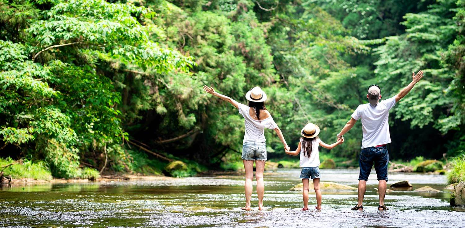 Family walking in Pennsylvania creek