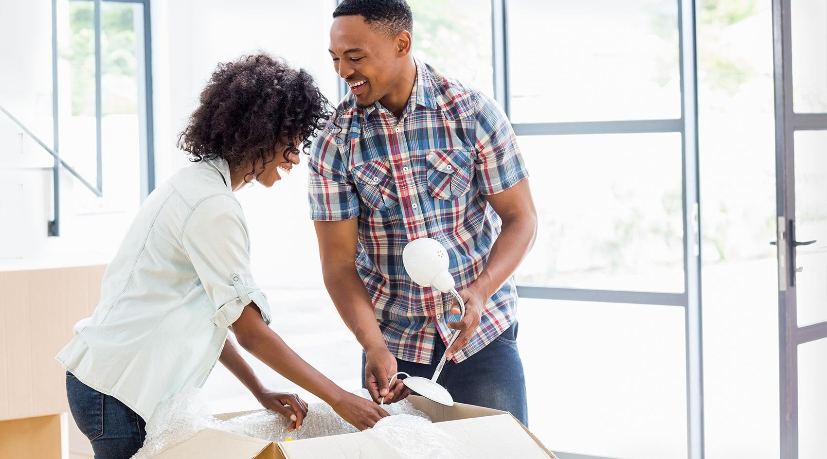 Young family moving into new home after transferring utilities