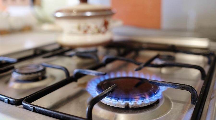 Ignited gas stove top 