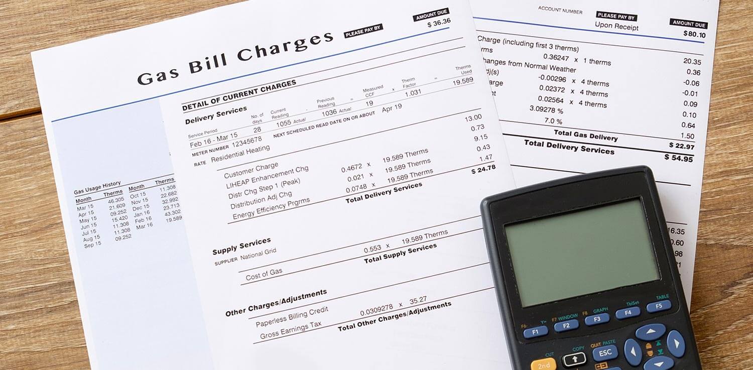 Paper and calculator on wood table