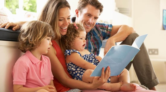 Family reading book together