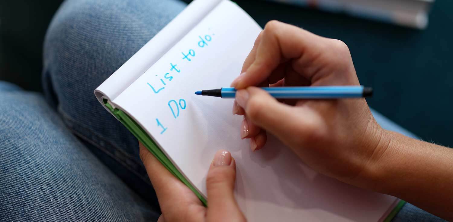 Woman starting her moving checklist