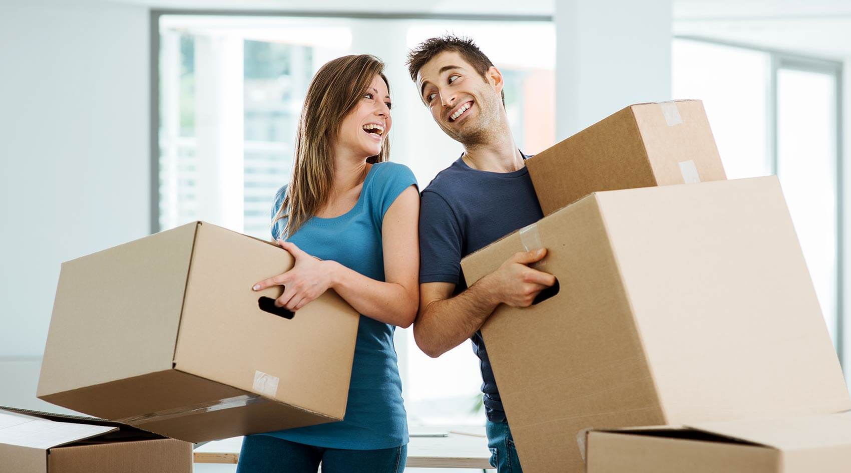 Couple moving into their Cincinnati home with boxes