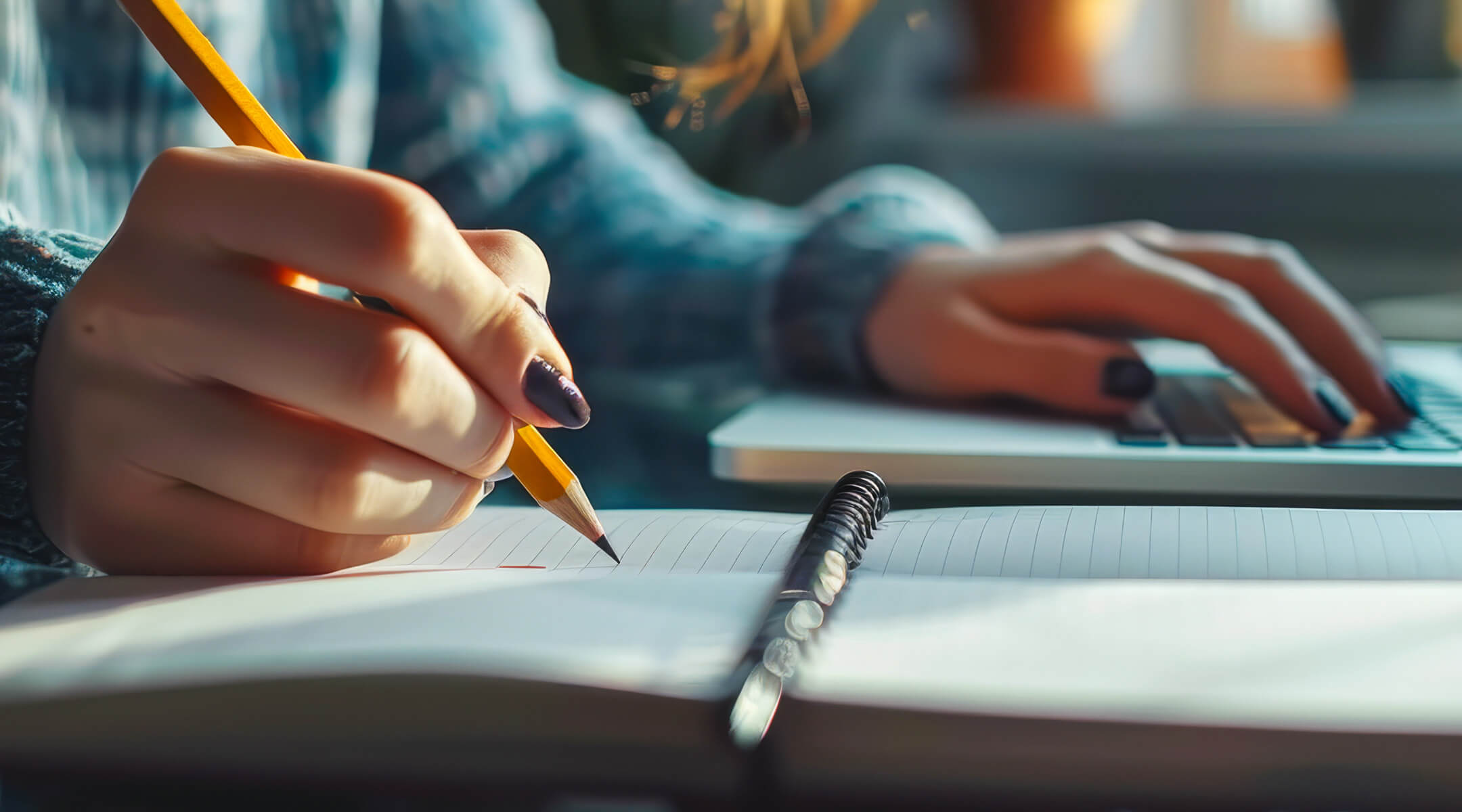 A woman creates a to-do list in a notebook