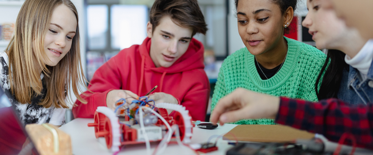 Students working on a robotic car
