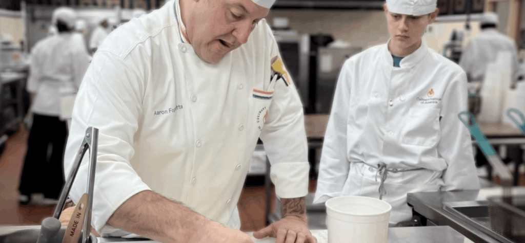 Student shadowing in a kitchen