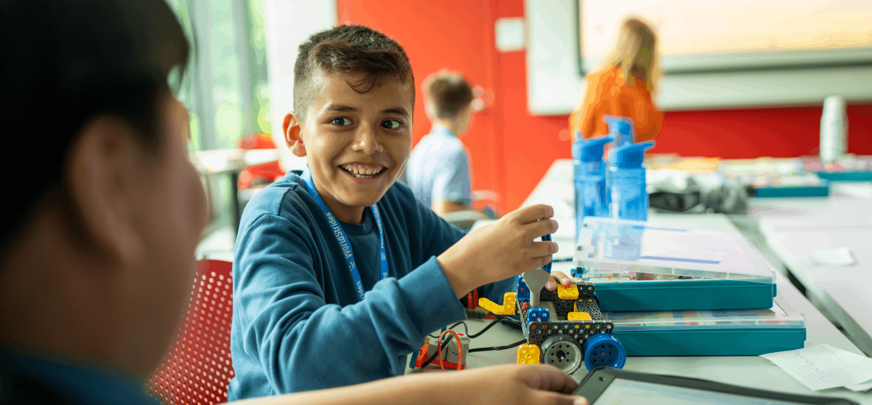 Student building a robotic car