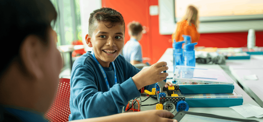 Student building a robotic car