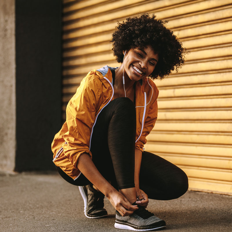 Woman and kid infront of a house