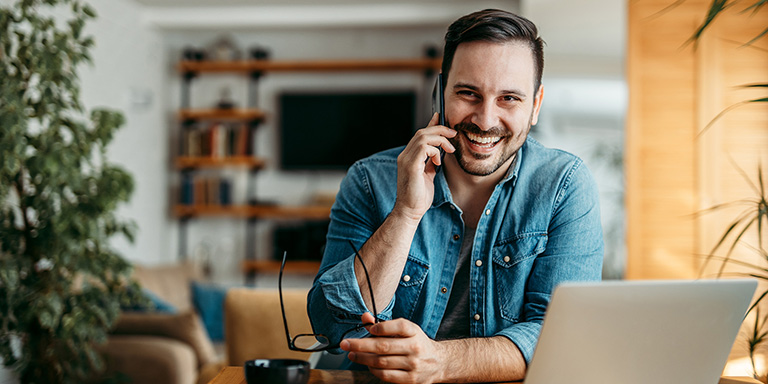 man-on-phone-smiling-1765867847