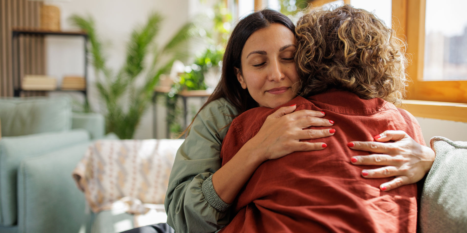 Women supporting each other at home