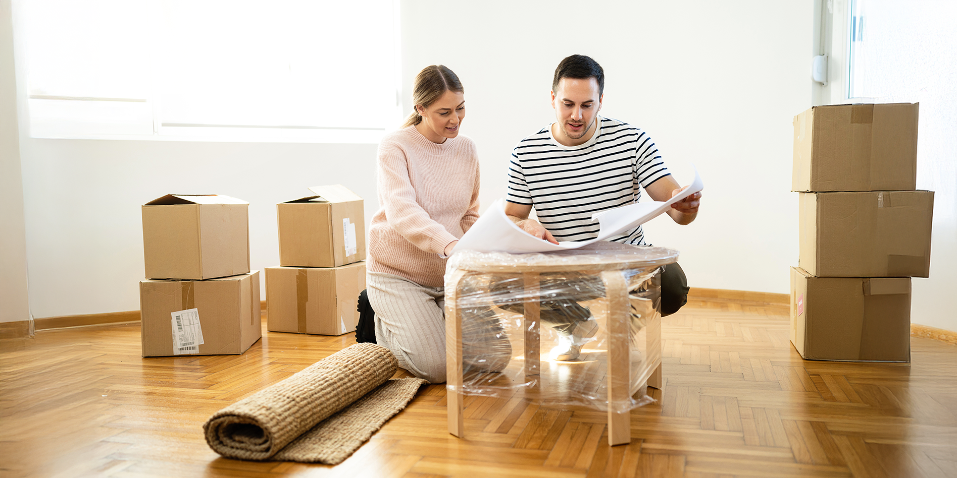 young couple unpacking
