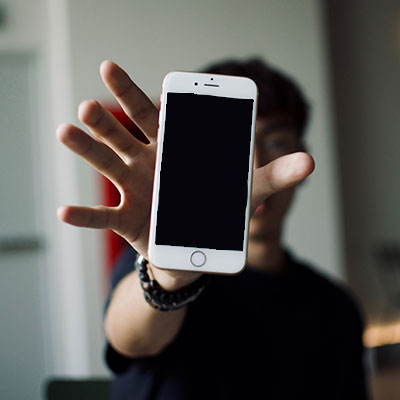 man showing phone screen