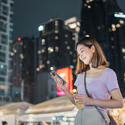 woman looking at phone