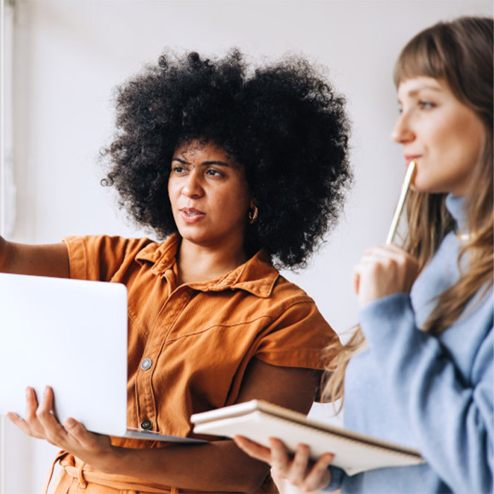 Two women working together on a project