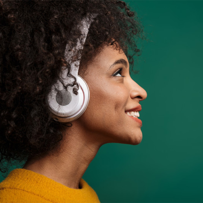 Woman listening to headphones
