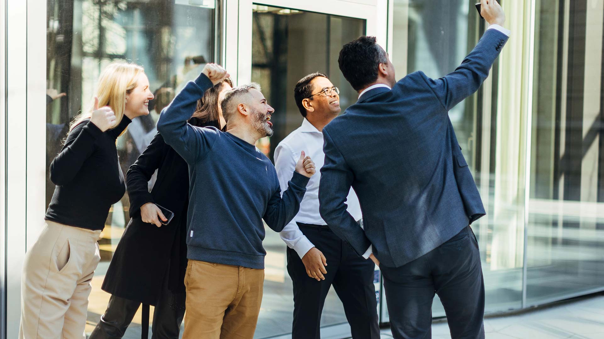 group of people taking selfie