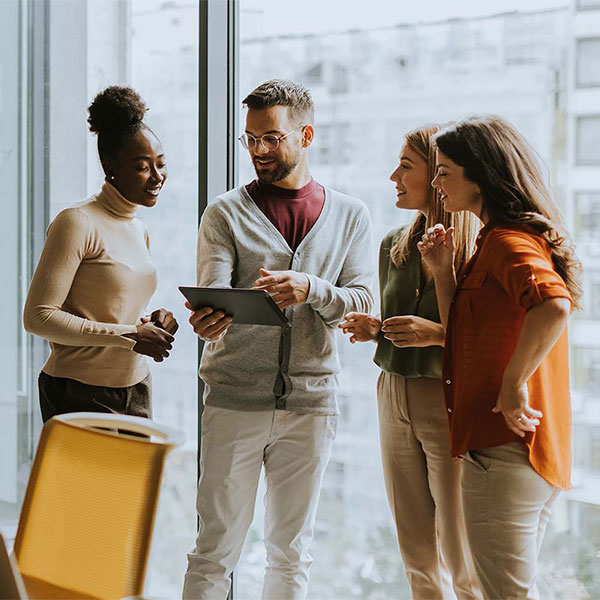 Young multiethnic startup team working in the modern office