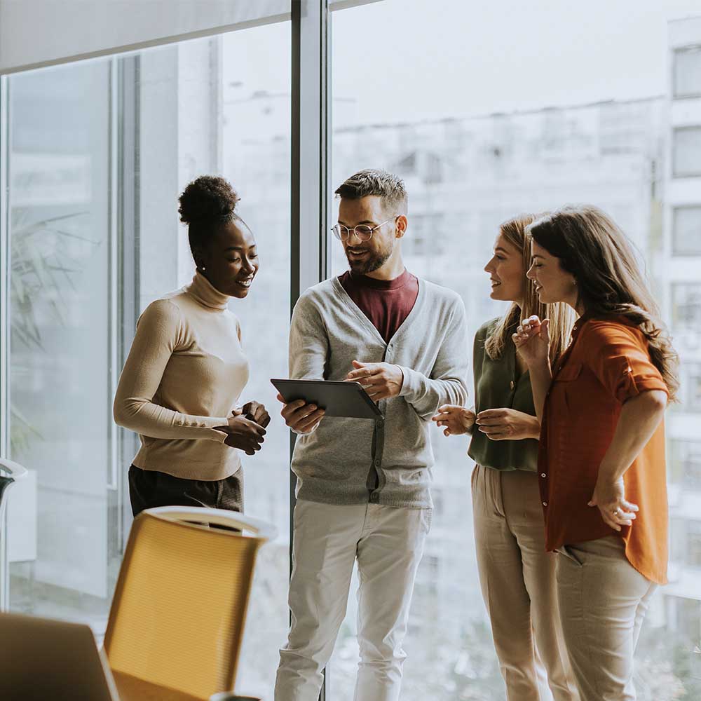 Young multiethnic startup team working in the modern office