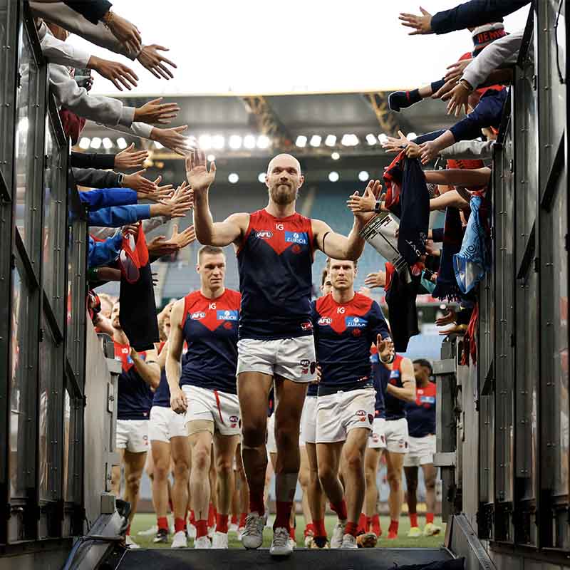 Max Gawn of the Demons lead the team off the ground after the round two AFL match
