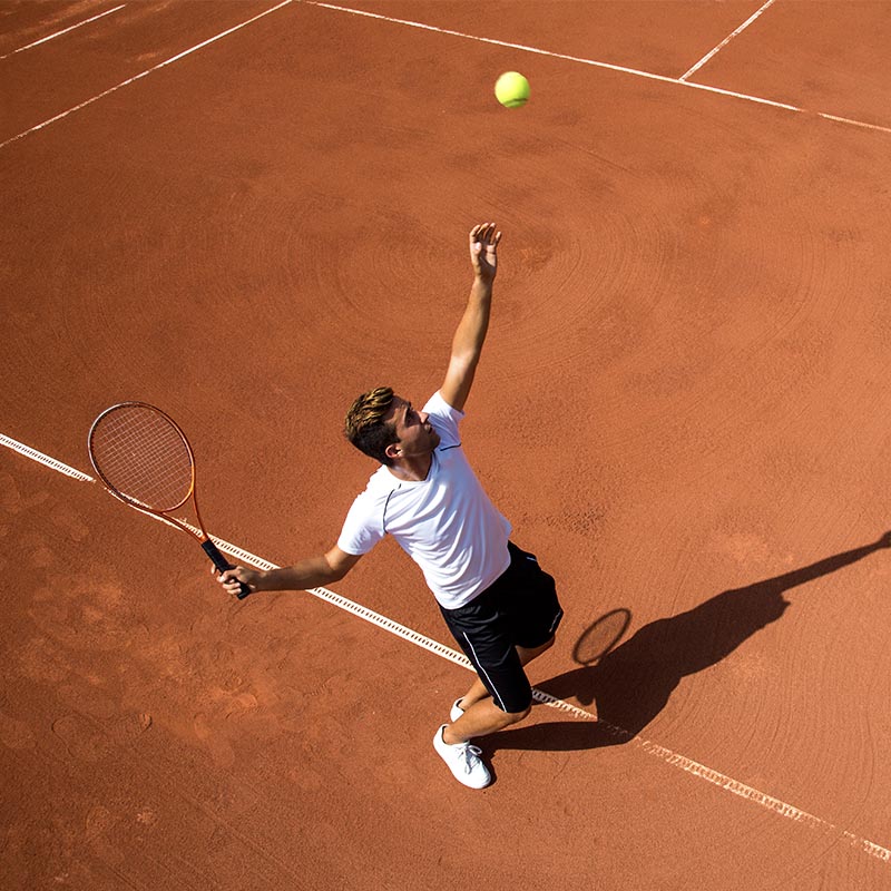 tennis player is serving