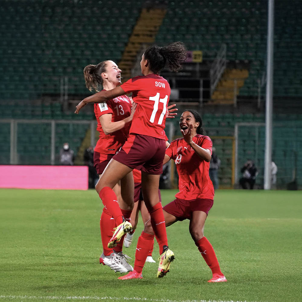 women team celebrating