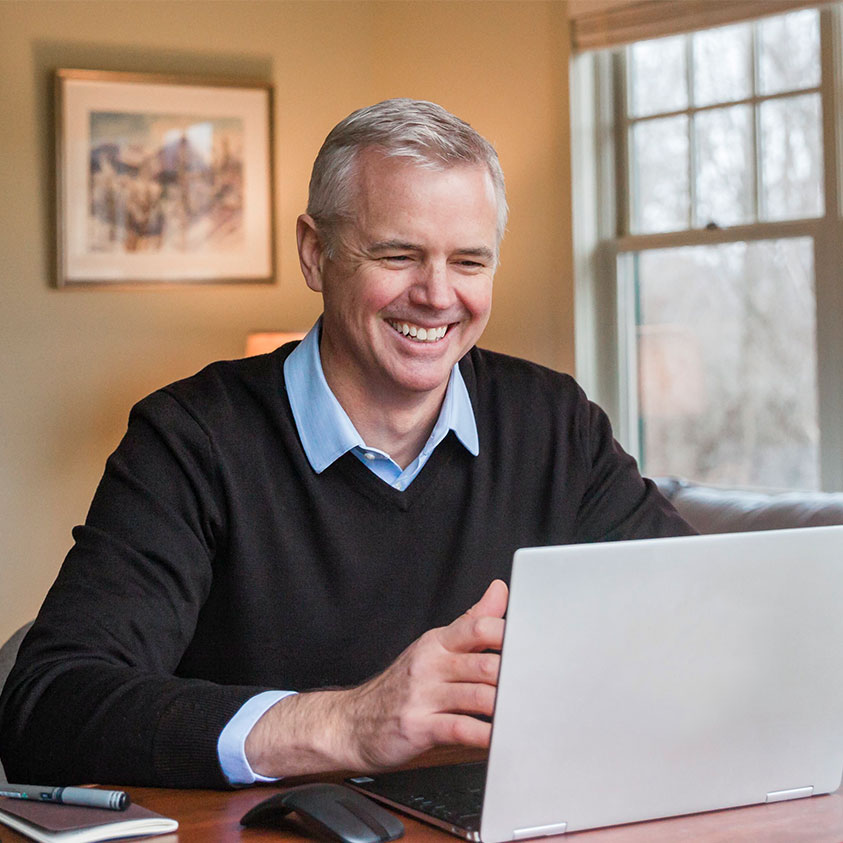 man working on laptop