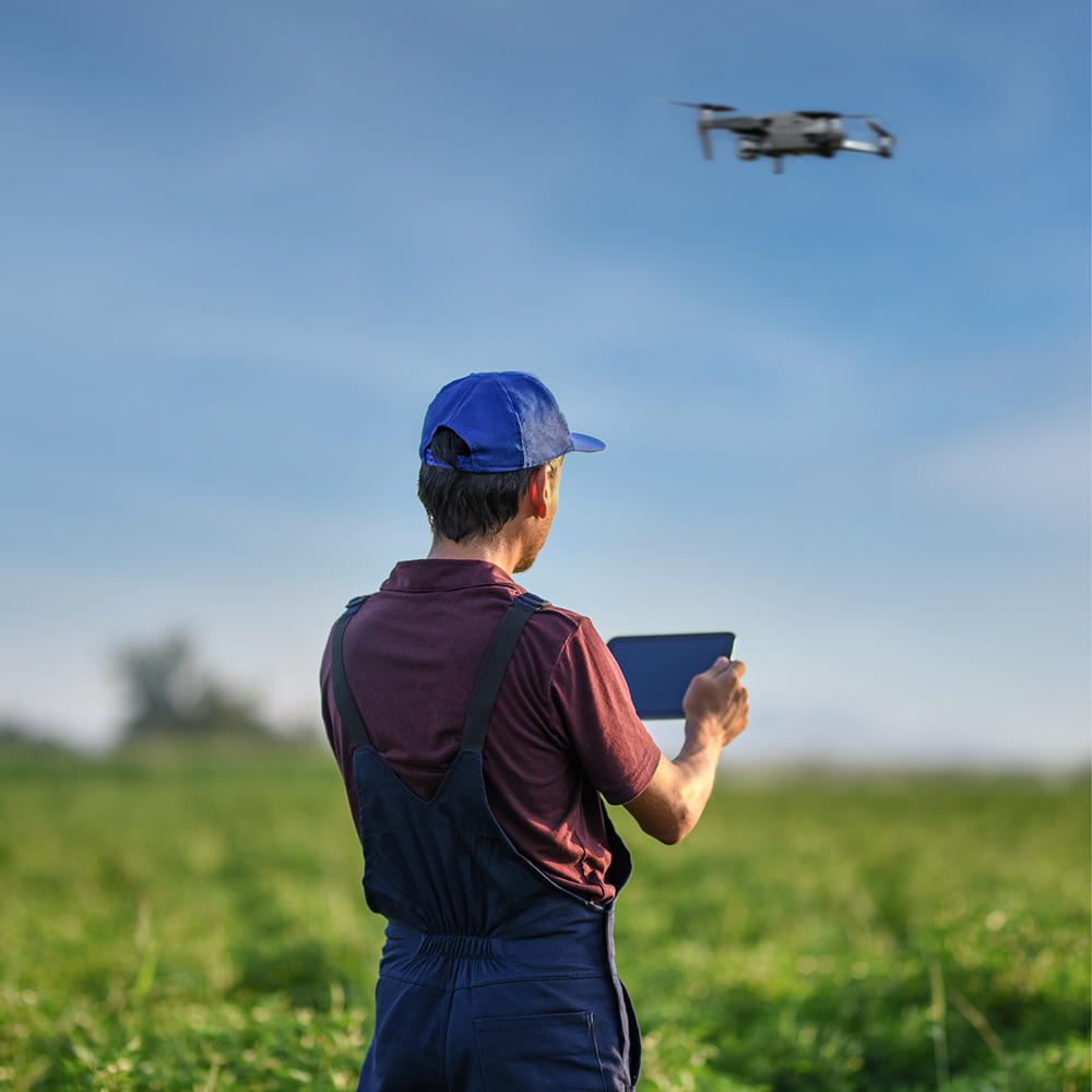 Man navigating a drone