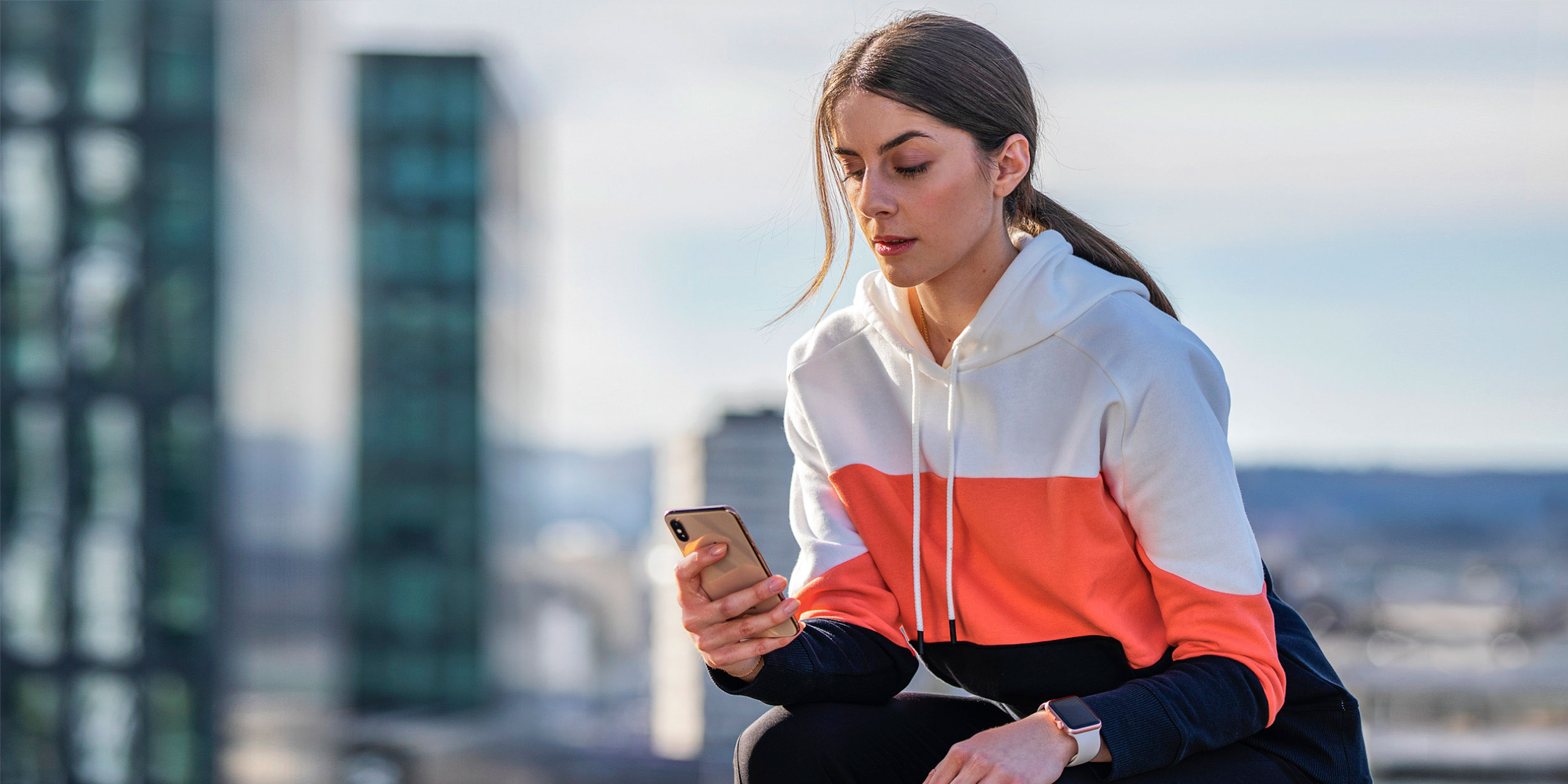 woman holding phone