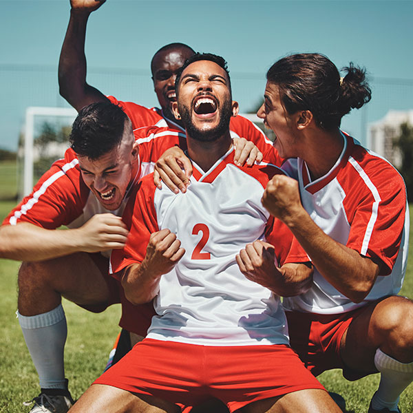 soccer player celebration during match at soccer field